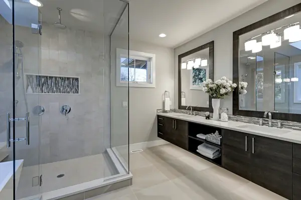 Remodelled bathroom with glass shower enclosure